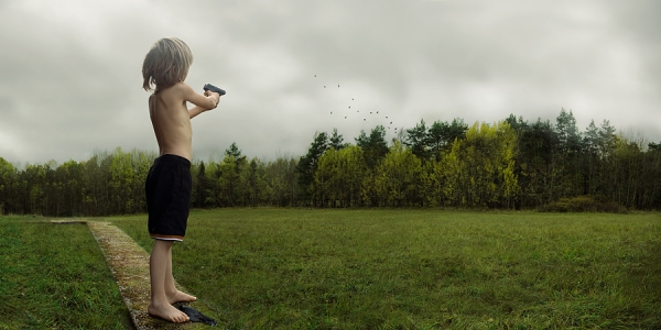 Photograph Anna Hurtig Kid With Gun on One Eyeland
